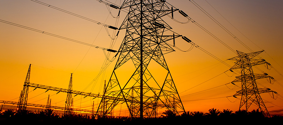 sunset against pylon tower